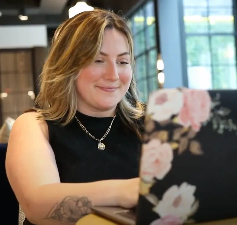 A woman working on her laptop